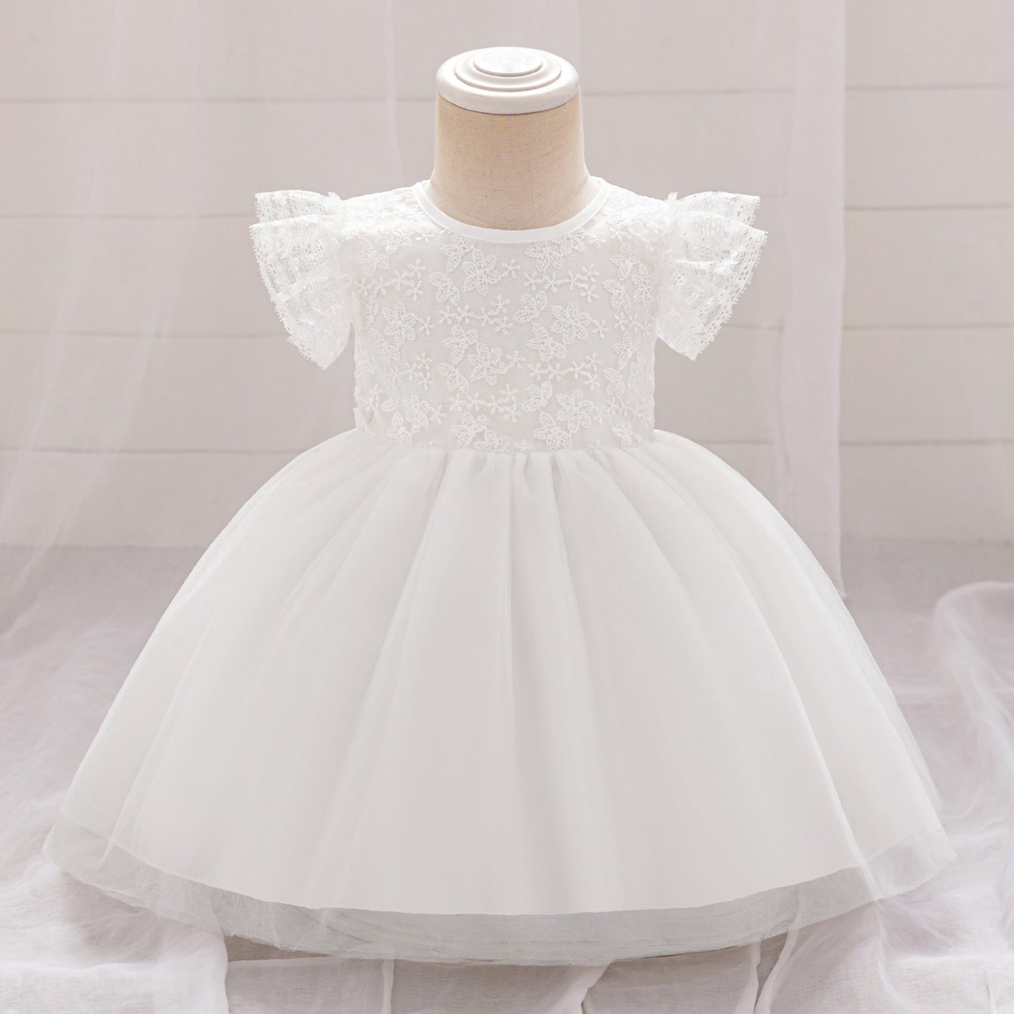 Frocklet Puffy Lace Baby Dress with Flutter Sleeves – Tea Length White Party Gown for 0-24 Months 1