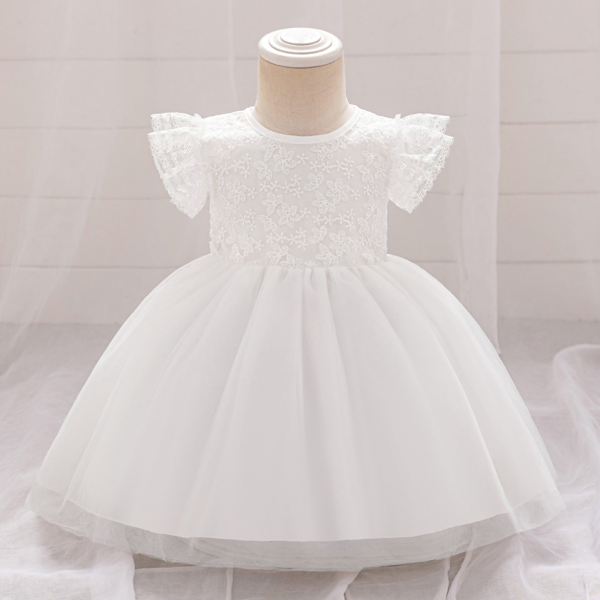 Frocklet Puffy Lace Baby Dress with Flutter Sleeves – Tea Length White Party Gown for 0-24 Months 1
