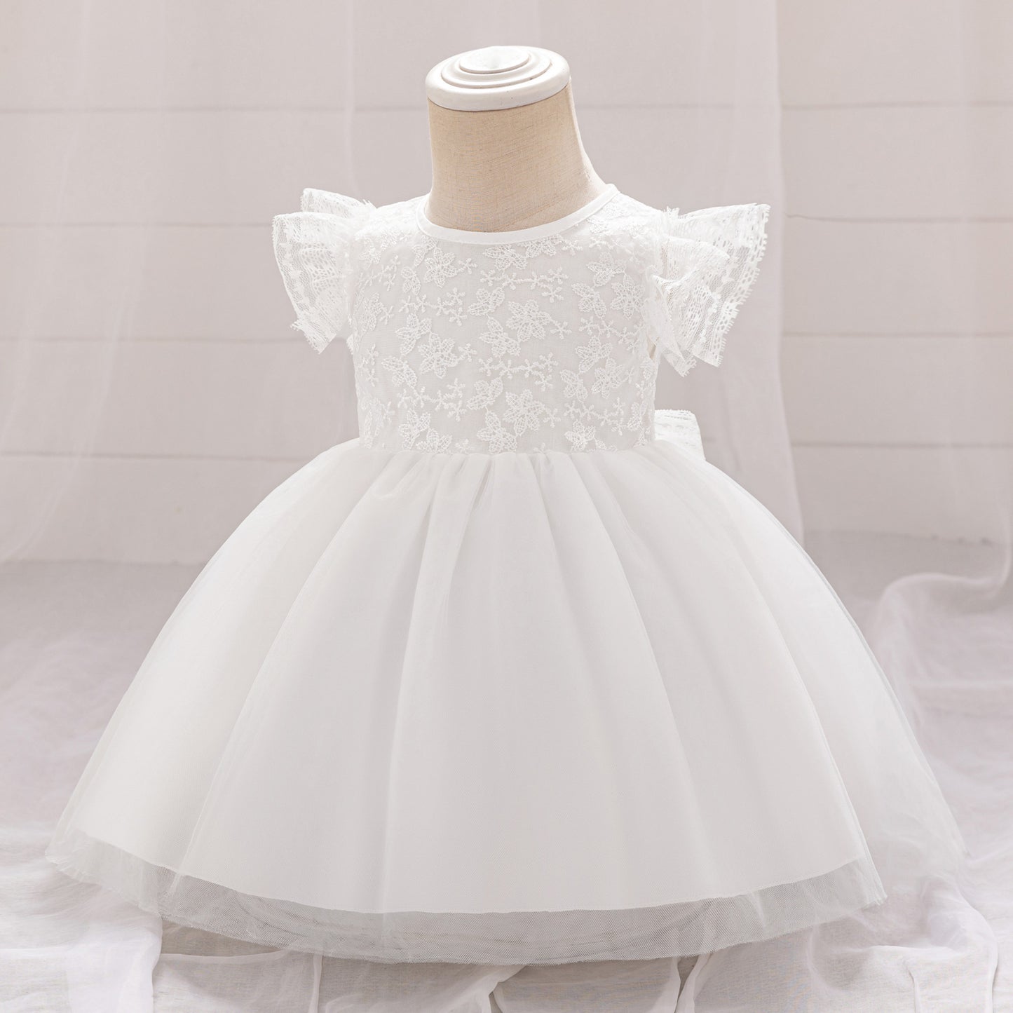Frocklet Puffy Lace Baby Dress with Flutter Sleeves – Tea Length White Party Gown for 0-24 Months 2