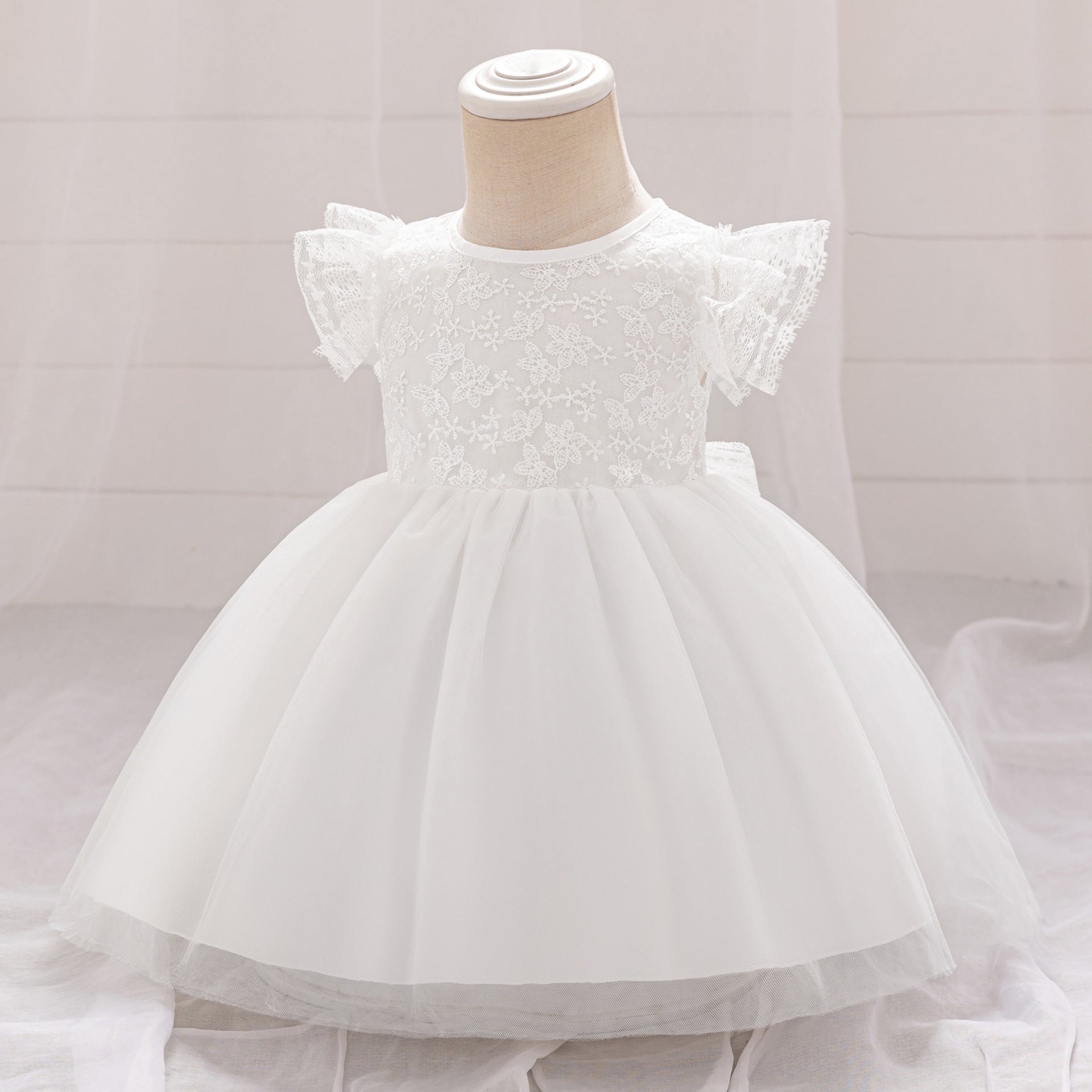 Frocklet Puffy Lace Baby Dress with Flutter Sleeves – Tea Length White Party Gown for 0-24 Months 2