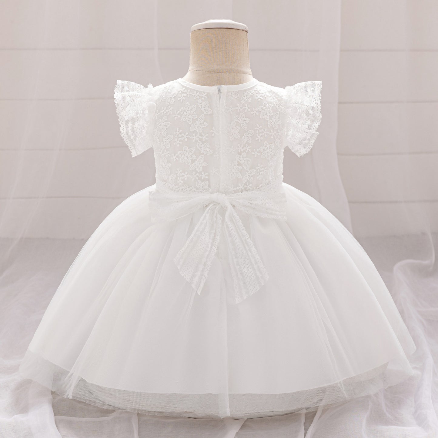 Frocklet Puffy Lace Baby Dress with Flutter Sleeves – Tea Length White Party Gown for 0-24 Months 3